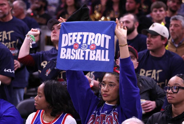 A Detroit Pistons fans holds up a towel during the fourth quarter of the Pistons game against the Cleveland Cavaliers in Cleveland, Ohio Friday May 15, 2026. The Pistons defeated the Cavaliers 115-94.  CLE20260515120 AARONxJOSEFCZYK