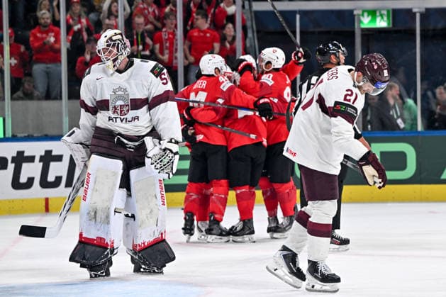 ZURICH, SWITZERLAND - MAY 16: Rudolfs Balcers of Latvia R) and goalkeeper Kristers Gudlevskis of Latvia L) disappointed after giving up a goal during the 2026 IIHF Ice hockey, Eishockey World Championship, WM, Weltmeisterschaft Switzerland game between Switzerland and Latvia at Swiss Life Arena on May 16, 2026 in Zurich, Zurich. Zurich Swiss Life Arena Zurich Switzerland Copyright: xJustPictures.ch AndreaxBrancax jp-en-EuSpIm-JP7_ANB_Sui_Lat_16052026_5621