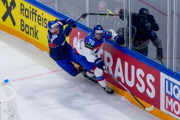 FRIBOURG, SWITZERLAND - MAY 17: Martin Pospisil of Slovakia R) against Peter Spornberger of Italy L) during the 2026 IIHF Ice hockey, Eishockey World Championship, WM, Weltmeisterschaft Switzerland game between Italy and Slovakia at BCF Arena on May 17, 2026 in Fribourg, Fribourg. Fribourg BCF Arena Fribourg Switzerland Copyright: xJustPictures.ch JarixPestelaccix jp-en-EuSpIm-JP6_JAR_Italy_Slovakia_16May2026_00030