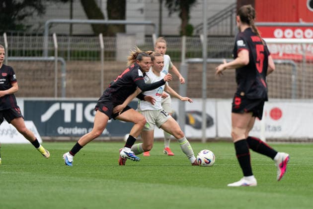 LEVERKUSEN, GERMANY - MAY 17: Carlotta Wamser (37 Bayer 04 Leverkusen) and Michelle Weiß (15 SV Werder Bremen) in action during the Google Pixel Frauen-Bundesliga match between Bayer 04 Leverkusen and SV Werder Bremen at Ulrich-Haberland-Stadion on May 17, 2026 in Leverkusen, Germany. (Photo by Qianru Zhang Press Photo) Copyright: xQianruxZhang SPPx Sportspressphoto_SPR148598