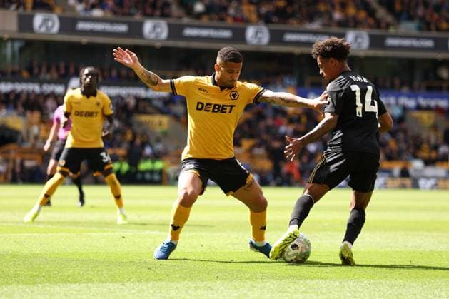 Joao Gomes of Wolverhampton Wanderers and Oscar Bobb of Fulham Wolverhampton Wanderers v Fulham, Premier League, Football, Molineux, Wolverhampton, UK - 17 May 2026Wolverhampton Molineux United Kingdom EDITORIAL USE ONLY No use with unauthorised audio, video, data, fixture lists, club league logos or live services. Online in-match use limited to 120 images, no video emulation. No use in betting, games or single club league player publications.  Copyright: xRyanxBrowne Shutterstockx 16877463dc