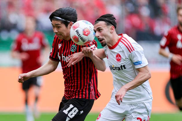 Daisuke Yokota (Hannover 96) und Berkay Yilmaz (1. FC Nuernberg) kaempfen um den Ball, 2. Bundesliga, Hannover 96 v 1. FC Nürnberg, Heinz von Heiden Arena am 17. May 2026 in Hannover, Deutschland. (Foto von Marco Steinbrenner DeFodi Images) Daisuke Yokota (Hannover 96) und Berkay Yilmaz (1. FC Nuernberg) battle for the ball, 2. Bundesliga, Hannover 96 v 1. FC Nürnberg, Heinz von Heiden Arena, May 17, 2026 in Hanover, Germany. (Photo by Marco Steinbrenner DeFodi Images) -