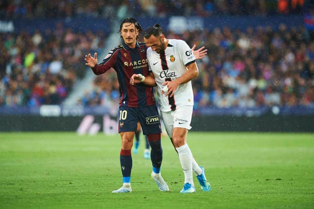 Pablo Martinez (Levante UD) and Vedat Muriqi (RCD Mallorca) during the LaLiga EA Sports match between Levante UD and RCD Mallorca at Ciudad de Valencia on May 17, 2026 in Valencia, Spain. (Photo by Maria Jose Segovia DeFodi Images) -