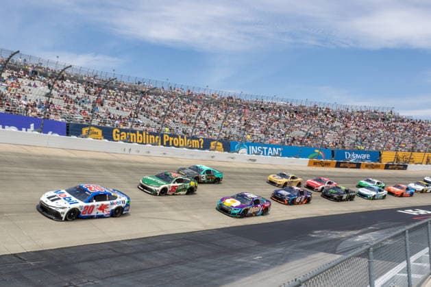 DOVER, DE - MAY 17: Christopher Bell ( 20 Joe Gibbs Racing Mobil 1 Toyota) leads a pack of cars through turn 1 during the NASCAR, Motorsport, USA Cup Series All-Star Race on May 17, 2026, at Dover Motor Speedway in Dover, DE. (Photo by David Hahn Icon Sportswire) AUTO: MAY 17 NASCAR Cup Series All-Star Race EDITORIAL USE ONLY Icon260517046
