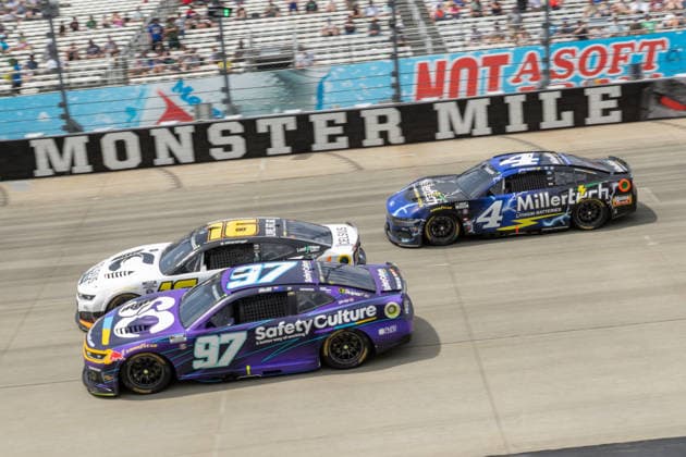 DOVER, DE - MAY 17: Shane Van Gisbergen ( 97 Trackhouse Racing SafetyCulture Chevrolet) races side by side with AJ Allmendinger ( 16 Kaulig Racing Celsius Chevrolet) for the lead during the second segment of the NASCAR, Motorsport, USA Cup Series All-Star Race on May 17, 2026, at Dover Motor Speedway in Dover, DE. (Photo by David Hahn Icon Sportswire) AUTO: MAY 17 NASCAR Cup Series All-Star Race EDITORIAL USE ONLY Icon260517050