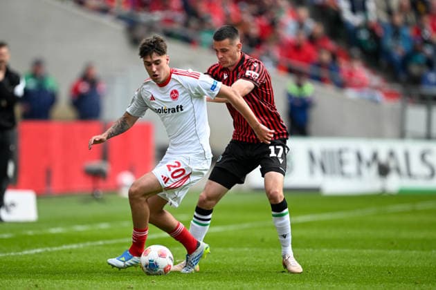 2. Bundesliga - Hannover 96 - 1. FC Nürnberg am 17.05.2026 in der HDI Arena in Hannover Bastian Allgeier (Hannover) im Zweikampf gegen Javier Fernandez (Nuernberg)