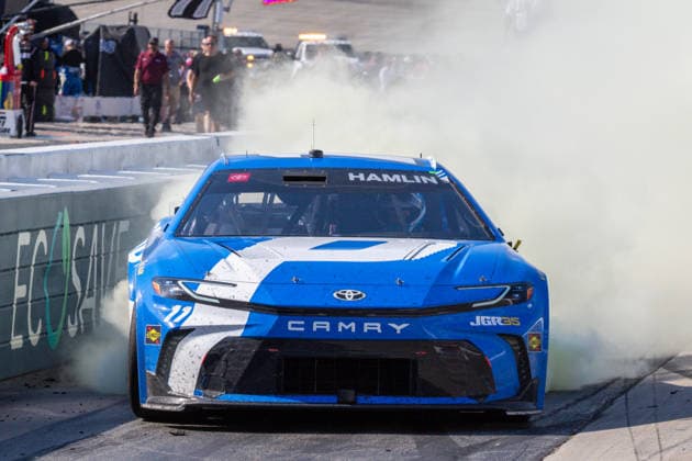 DOVER, DE - MAY 17: Denny Hamlin ( 11 Joe Gibbs Racing Progressive Insurance Toyota) celebrates with a burnout after winning the NASCAR, Motorsport, USA Cup Series All-Star Race on May 17, 2026, at Dover Motor Speedway in Dover, DE. (Photo by David Hahn Icon Sportswire) AUTO: MAY 17 NASCAR Cup Series All-Star Race EDITORIAL USE ONLY Icon260517054