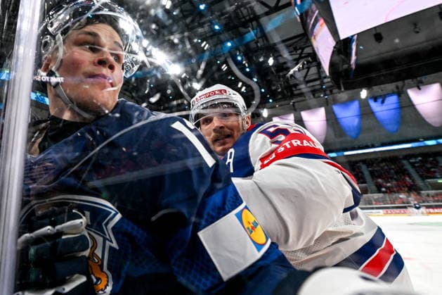 ZURICH, SWITZERLAND - MAY 18: Jesse Puljujarvi of Finland and Ryan Lindgren of United States in a battle along the boards during the 2026 IIHF Ice hockey, Eishockey World Championship, WM, Weltmeisterschaft Switzerland game between Finland and USA at Swiss Life Arena on May 18, 2026 in Zurich, Zurich. Zurich Swiss Life Arena Zurich Switzerland Copyright: xJustPictures.ch AndreaxBrancax jp-en-EuSpIm-JP7_ANB_Fin_USA_18052026_4701