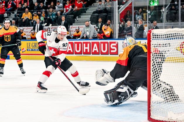 ZURICH, SWITZERLAND - MAY 18: Theo Rochette of Switzerland in action against goalkeeper Jonas Stettmer of Germany during the 2026 IIHF Ice hockey, Eishockey World Championship, WM, Weltmeisterschaft Switzerland game between Germany and Switzerland at Swiss Life Arena on May 18, 2026 in Zurich, Zurich. Zurich Swiss Life Arena Zurich Switzerland Copyright: xJustPictures.ch AndreaxBrancax jp-en-EuSpIm-JP7_ANB_Ger_Sui_18052026_1246