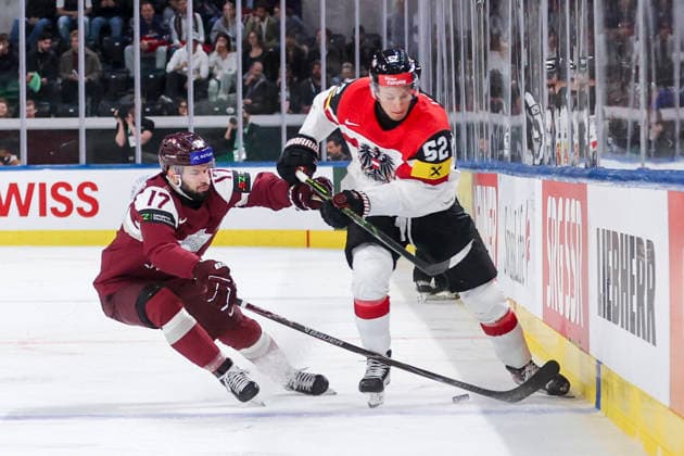 Ice hockey, Eishockey - IIHF WC 2026 ZURICH,SWITZERLAND,19.MAY.26 - ICE HOCKEY - IIHF Ice Hockey World Championship, WM, Weltmeisterschaft 2026, group stage, Austria vs Latvia. Image shows Martins Dzierkals (LAT) and Paul Huber (AUT).  GEPAxpictures xMaticxKlansek