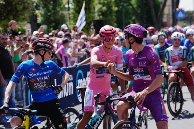 Portugal™s Afonso Oliveira Eulalio of Bahrain Victorious pink jersey ,France™s Paul Magnier of Soudal Quick-Step ciclamino jersey ,Denmark™s Jonas Vingegaard Hansen of Team Visma Lease A Bike blue jersey during Stage 11 of the Giro d™Italia from Porcari to Chiavari, Italy, Wednesday May 20, 2026.  Copyright: xGianmattiaxD Albertoi LaPressex