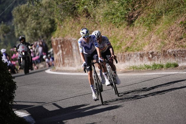 Spain™s Enric Mas Nicolau of Movistar Team and Ecuador™s Manuel Jhonatan Narvaez of UAE Team Emirates XRG during Stage 11 of the Giro d™Italia, from Porcari to Chiavari, Italy, Wednesday, May 20, 2026.  Copyright: xMarcoxAlpozzi LaPressex