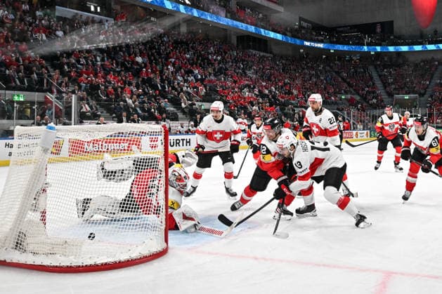ZURICH, SWITZERLAND - MAY 20: Nico Hischier of Switzerland scores a goal against goalkeeper David Kickert of Austria during the 2026 IIHF Ice hockey, Eishockey World Championship, WM, Weltmeisterschaft Switzerland game between Austria and Switzerland at Swiss Life Arena on May 20, 2026 in Zurich, Zurich. Zurich Swiss Life Arena Zurich Switzerland Copyright: xJustPictures.ch AndreaxBrancax jp-en-EuSpIm-JP7_ANB_Aut_Swi_20052026_7006-2