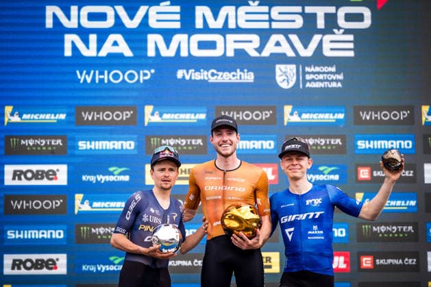 World Cup cross country mountain bike shorttrack men s race, Vysocina Arena, Nove Mesto na Morave, May 23, 2026. The second placed Tom Pidcock from the United Kingdom, from left, winner Mathis Azzaro from France and the third placed Dario Lillo from Switzerland. (CTKxPhoto JaroslavxSvoboda) CTKPhotoP2026052303156  CTKPhotoP2026052303156