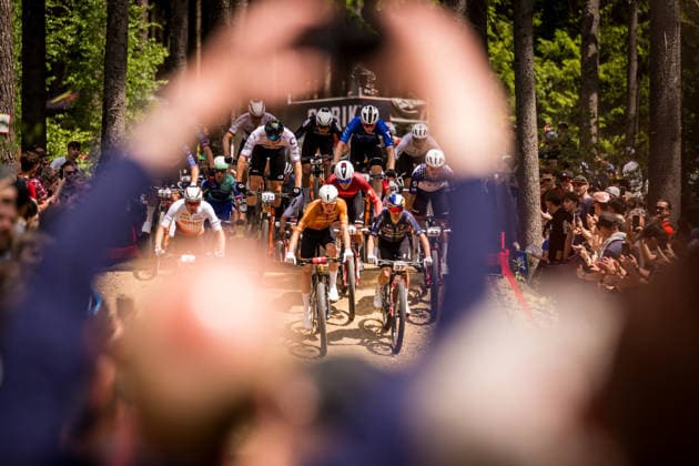 World Cup cross country mountain bike shorttrack men s race, Vysocina Arena, Nove Mesto na Morave, May 23, 2026. From left Jordan Sarrou from France, Mathis Azzaro from France and Tom Pidcock from the United Kingdom. (CTKxPhoto JaroslavxSvoboda) CTKPhotoP2026052303159  CTKPhotoP2026052303159