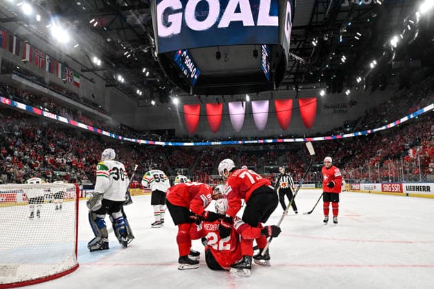 ZURICH, SWITZERLAND - MAY 23: Nino Niederreiter of Switzerland C) celebrates a goal that will be later disallowed with Christoph Bertschy of Switzerland L) and Calvin Thurkauf of Switzerland R) during the 2026 IIHF Ice hockey, Eishockey World Championship, WM, Weltmeisterschaft Switzerland game between Switzerland and Hungary at Swiss Life Arena on May 23, 2026 in Zurich, Zurich. Zurich Swiss Life Arena Zurich Switzerland Copyright: xJustPictures.ch AndreaxBrancax jp-en-EuSpIm-JP7_ANB_Sui_Hung_23052026_1275