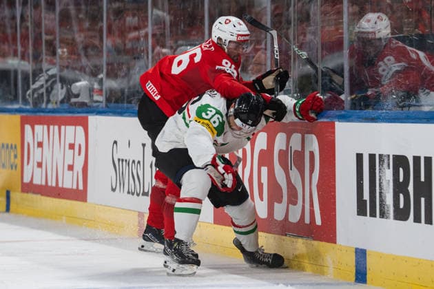ZURICH, ZURICH - MAY 23: Janis Moser of Switzerland battles with Csanad Erdely of Hungary during the 2026 IIHF World Championship, WM, Weltmeisterschaft Preliminary Round Group A match between Switzerland and Hungary at Swiss Life Arena on May 23, 2026 in Zurich, Zurich, Switzerland. Copyright: xLivioxBaeriswylx xSPPx Sportspressphoto_152426