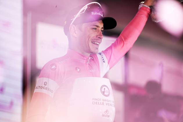 The pink jersey Denmark™s Jonas Vingegaard Hansen of Team Visma Lease A Bike celebrate on the podium after the Stage 14 of the Giro d™Italia, from Aosta to Pila, Italy, Saturday, May 23, 2026.  Copyright: xMarcoxAlpozzi LaPressex