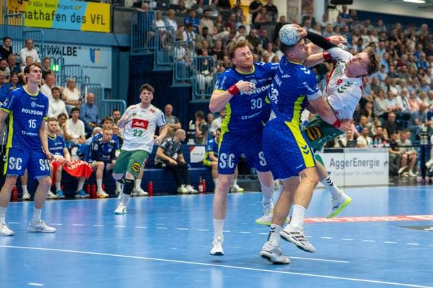 Morten Hempel Jensen, Rueckraum, (TSV GWD Minden 9), Tom Kiesler, Rueckraum, (VfL Gummersbach 30), Å tÄ›pan Zeman, Kreislaeufer, (VfL Gummersbach 66), VfL Gummersbach vs. TSV GWD Minden, Daikin Handball Bundesliga, Herren , 30. Spieltag, 23.05.2026 Gummersbach NRW Deutschland