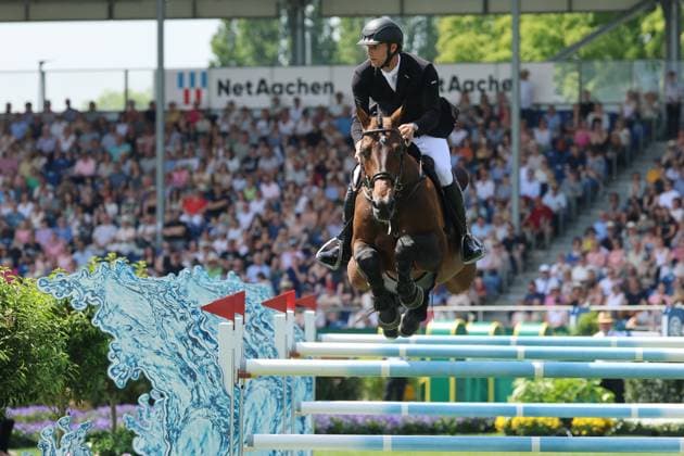 Richard Vogel (GER) mit Pferd United Touch S, Nullrunde im 1. Umlauf , Rolex Grand Slam of Show Jumping, Springprüfung mit zwei Umläufen und Stechen , Weltfest des Pferdesports, World Equestrian Festival, TSCHIO Aachen 2026, TSCHIO statt CHIO 2026, Aachener Soers, 22. bis 24. Mai 2026, Reitsport, 24.05.2026, Aachen Aachener Soers Deutschland