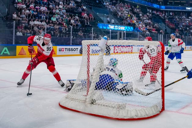 FRIBOURG, SWITZERLAND - MAY 24: Nick Olesen of Denmark L) against goalkeeper Davide Fadani of Italy during the 2026 IIHF Ice hockey, Eishockey World Championship, WM, Weltmeisterschaft Switzerland game between Denmark and Italy at BCF Arena on May 24, 2026 in Fribourg, Fribourg. Fribourg BCF Arena Fribourg Switzerland Copyright: xJustPictures.ch JarixPestelaccix jp-en-EuSpIm-JP6_JAR_Denmark_Italy_24May2026_00014