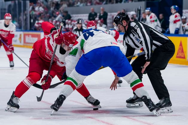 FRIBOURG, SWITZERLAND - MAY 24: Nick Olesen of Denmark L) against Ivan Deluca of Italy C) during the 2026 IIHF Ice hockey, Eishockey World Championship, WM, Weltmeisterschaft Switzerland game between Denmark and Italy at BCF Arena on May 24, 2026 in Fribourg, Fribourg. Fribourg BCF Arena Fribourg Switzerland Copyright: xJustPictures.ch JarixPestelaccix jp-en-EuSpIm-JP6_JAR_Denmark_Italy_24May2026_00031