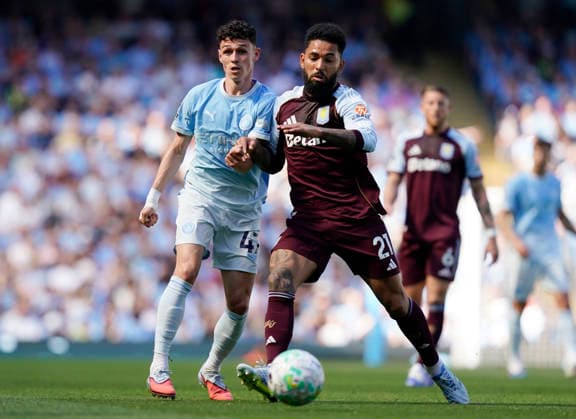Manchester, England, 24th May 2026. Phil Foden of Manchester City and Douglas Luiz of Aston Villa during the Manchester City vs Aston Villa Premier League match at the Etihad Stadium, Manchester. Picture credit should read: Andrew Yates Sportimage EDITORIAL USE ONLY. No use with unauthorised audio, video, data, fixture lists, club league logos or live services. Online in-match use limited to 120 images, no video emulation. No use in betting, games or single club league player publications. SPI_020_AY_Man_City_Villa SPI-4819-0021