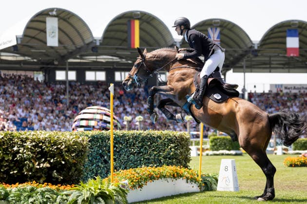Richard VOGEL (GER) auf United Touch S, im Absprung zum Wassergraben, Aktion, im 1. Umlauf, Springen S6: ROLEX Grand Prix, Part of the ROLEX Grand Slam of Show Jumping, Der grosse Preis von Aachen, Springpruefung mit zwei Umlaeufen und Stechen, CSI5*, am 24.05.2026, Weltfest des Pferdesport, TSCHIO Aachen 2026 vom 22. - 24.05.2026 in Aachen Deutschland; Â