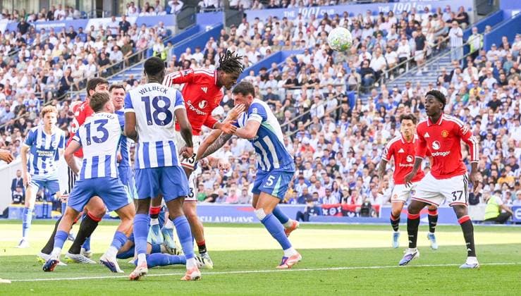 Patrick Dorgu of Manchester United, ManU heads in their first goal during the Premier League match between Brighton and Hove Albion and Manchester United at the American Express Stadium , Brighton , UK - 24th May 2026 Brighton & Hove Albion vs Manchester United Premier League Football, Amex Stadium, Sussex, United Kingdom - 24 May 2026Brighton Amex Stadium Sussex United Kingdom EDITORIAL USE ONLY No use with unauthorised audio, video, data, fixture lists, club league logos or live services. Online in-match use limited to 120 images, no video emulation. No use in betting, games or single club league player publications. . No mer Copyright: xSimonxDack TPI Shutterstockx 16895822x