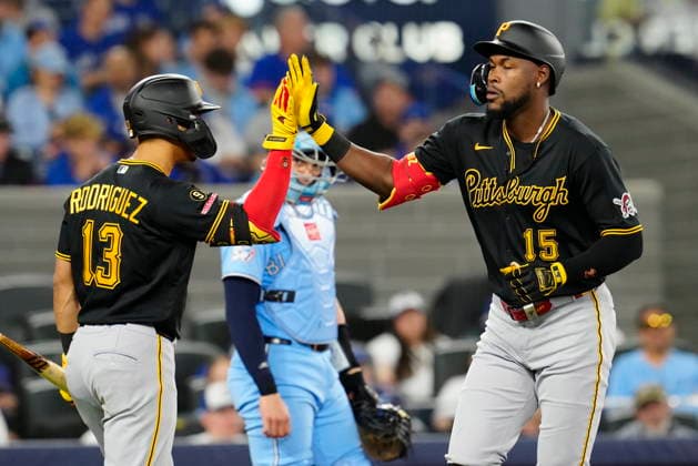 May 25, 2026, Toronto, On, Canada: Pittsburgh Pirates centre fielder Oneil Cruz (15) celebrates his home run with teammate Endy RodroÂ­guez (13) during second inning MLB, Baseball Herren, USA baseball action against the Toronto Blue Jays in Toronto on Sunday, May 24, 2026. Canada News - May 25, 2026  - ZUMAc35_ 20260525_zaf_c35_006 Copyright: xFrankxGunnx