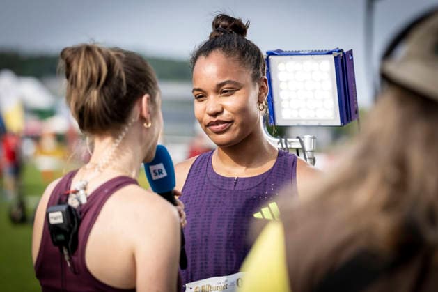 REHLINGEN , GERMANY - MAY 24: Yemisi Mabry (GER MTG Mannheim) interviewed by Katrin Schmidt of SR during the 61. Internationales Pfingstsportfest on 24.05.2026 at the Bungertstadion in Rehlingen-Siersburg (Saarland Deutschland). Saarland Deutschland Copyright: xLeahxKohringx