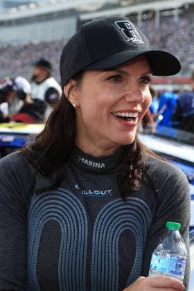 CHARLOTTE, NC - MAY 24: Katherine Legge ( 78 Live Fast Motorsports e.l.f. Cosmetics Chevrolet) talks with a member of her race team while wearing a hat honoring the late Kyle Busch prior to the running of the NASCAR, Motorsport, USA Cup Series Coca-Cola 600 on May 24, 2026 at Charlotte Motor Speedway in Charlotte, NC. (Photo by Jeff Robinson Icon Sportswire) AUTO: MAY 24 NASCAR Cup Series Coca-Cola 600 EDITORIAL USE ONLY Icon2605246889600