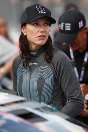 CHARLOTTE, NC - MAY 24: Katherine Legge ( 78 Live Fast Motorsports e.l.f. Cosmetics Chevrolet) talks with a member of her race team while wearing a hat honoring the late Kyle Busch prior to the running of the NASCAR, Motorsport, USA Cup Series Coca-Cola 600 on May 24, 2026 at Charlotte Motor Speedway in Charlotte, NC. (Photo by Jeff Robinson Icon Sportswire) AUTO: MAY 24 NASCAR Cup Series Coca-Cola 600 EDITORIAL USE ONLY Icon2605247979600