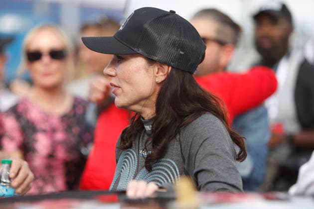 CHARLOTTE, NC - MAY 24: Katherine Legge ( 78 Live Fast Motorsports e.l.f. Cosmetics Chevrolet) talks with a member of her race team while wearing a hat honoring the late Kyle Busch prior to the running of the NASCAR, Motorsport, USA Cup Series Coca-Cola 600 on May 24, 2026 at Charlotte Motor Speedway in Charlotte, NC. (Photo by Jeff Robinson Icon Sportswire) AUTO: MAY 24 NASCAR Cup Series Coca-Cola 600 EDITORIAL USE ONLY Icon2605247997600