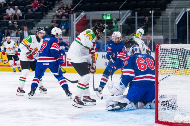 ZURICH, SWITZERLAND - MAY 25: Doman Szongoth (Hungary, 5) inis front of Joseph Woll (United States, 60) during the Preliminary Round - Group A Match 47 between United States and Hungary at the IIHF Ice hockey, Eishockey World Championship, WM, Weltmeisterschaft 2026, Swiss Life Arena on May 25, 2026 in Zurich, Switzerland. Zurich Switzerland Copyright: xTimoxSteinx