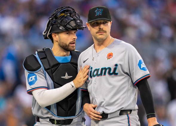 May 25, 2026, Toronto, On, CAN: Miami Marlins catcher Joe Mack (80) gives starting pitcher Janson Junk (26) a congratulatory pat following fourth inning MLB, Baseball Herren, USA action against the Toronto Blue Jays in Toronto on Monday May 25, 2026. Canada News - May 25, 2026  - ZUMAc35_ 20260525_zaf_c35_171 Copyright: xFrankxGunnx