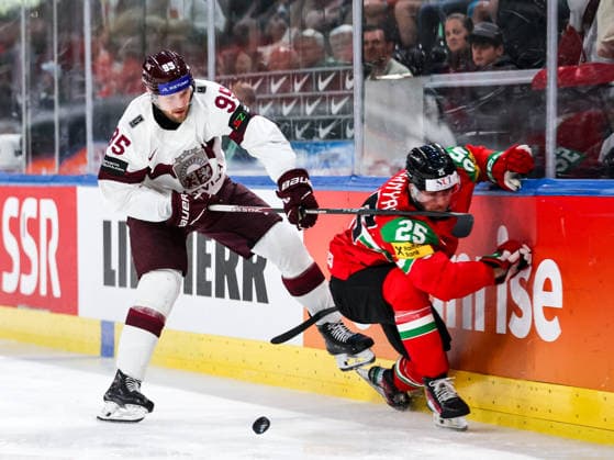 Ice hockey, Eishockey - IIHF WC 2026 ZURICH,SWITZERLAND,26.MAY.26 - ICE HOCKEY - IIHF Ice Hockey World Championship, WM, Weltmeisterschaft 2026, group stage, Hungary vs Latvia. Image shows Oskars Batna (LAT) and Gabor Tornyai (HUN).  GEPAxpictures xMaticxKlansek