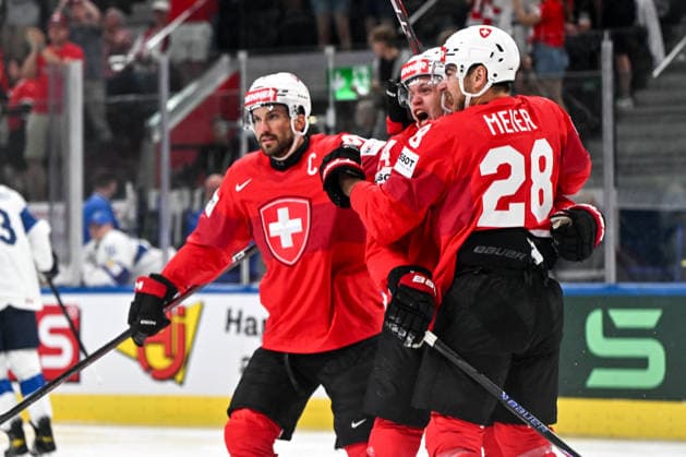 ZURICH, SWITZERLAND - MAY 26: Attilio Biasca of Switzerland C) celebrates his goal with Timo Meier of Switzerland R) during the 2026 IIHF Ice hockey, Eishockey World Championship, WM, Weltmeisterschaft Switzerland game between Switzerland and Finland at Swiss Life Arena on May 26, 2026 in Zurich, Zurich. Zurich Swiss Life Arena Zurich Switzerland Copyright: xJustPictures.ch AndreaxBrancax jp-en-EuSpIm-JP7_ANB_SuiFin_26052026_7389