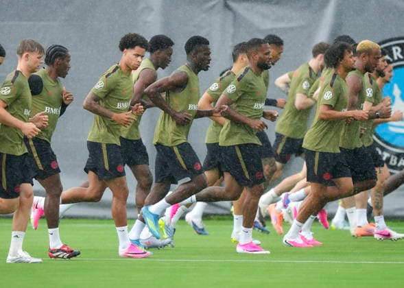 May 26, 2026, Charlotte, Nc, UNITED STATES: Team Canada players run in the pouring rain during World Cup roster selection camp in Charlotte, N.C., on Tuesday, May 26, 2026. Canada News - May 26, 2026  - ZUMAc35_ 20260526_zaf_c35_080 Copyright: xNathanxDenettex