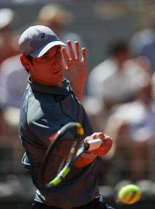 (260527) -- PARIS, May 27, 2026 -- Valentin Royer hits a return during the men s singles second round match between Novak Djokovic of Serbia and Valentin Royer of France at the French Open tennis tournament at Roland Garros, Paris, France, May 27, 2026. ) (SP)FRANCE-PARIS-TENNIS-FRENCH OPEN-MEN S SINGLES-2ND ROUND-NOVAK DJOKOVIC VS VALENTIN ROYER WuxHuiwo 