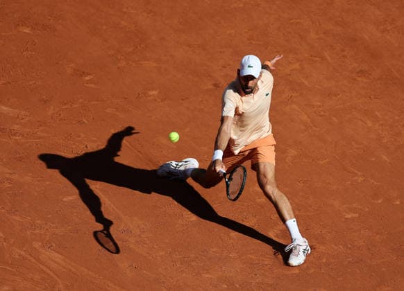 (260527) -- PARIS, May 27, 2026 -- Novak Djokovic hits a return during the men s singles second round match between Novak Djokovic of Serbia and Valentin Royer of France at the French Open tennis tournament at Roland Garros, Paris, France, May 27, 2026. ) (SP)FRANCE-PARIS-TENNIS-FRENCH OPEN-MEN S SINGLES-2ND ROUND-NOVAK DJOKOVIC VS VALENTIN ROYER WuxHuiwo