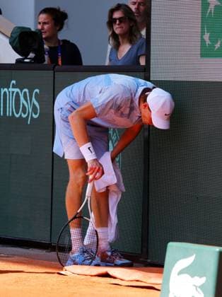 Jannik Sinner wretches at the back of the court as Amelie Mauresmo looks on French Open Tennis, Day Five, Tennis, Roland Garros, Paris, France - 28 May 2026Paris Roland Garros France EDITORIAL USE ONLY No use with unauthorised audio, video, data, fixture lists, club league logos or live services. Online in-match use limited to 120 images, no video emulation. No use in betting, games or single club league player publications.  Copyright: xJavierxGarcia Shutterstockx 16898263o