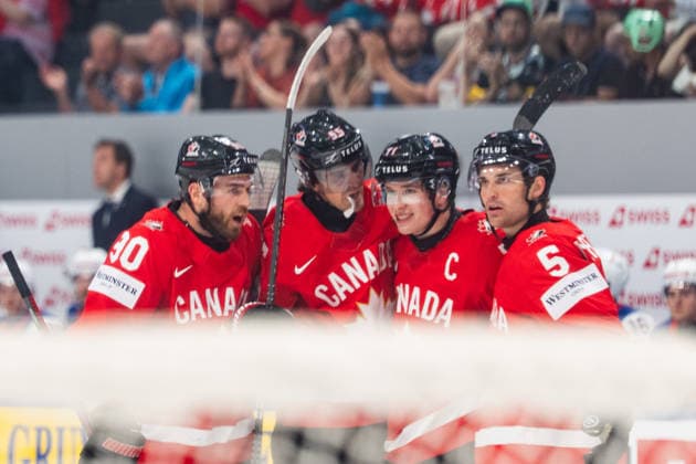 FRIBOURG, FRIBOURG - MAY 28: Canada players celebrate for the first time after Macklin Celebrini scored during the 2026 IIHF World Championship, WM, Weltmeisterschaft quarterfinal match between Canada and the United States at BCF Arena on May 28, 2026 in Fribourg, Fribourg, Switzerland. Copyright: xLivioxBaeriswylx xSPPx Sportspressphoto_SPR156129