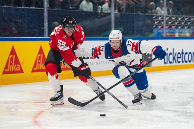 FRIBOURG, FRIBOURG - MAY 28: Mark Scheifele of Canada battles with Will Borgen of the United States during the 2026 IIHF World Championship, WM, Weltmeisterschaft quarterfinal match between Canada and the United States at BCF Arena on May 28, 2026 in Fribourg, Fribourg, Switzerland. Copyright: xLivioxBaeriswylx xSPPx Sportspressphoto_SPR156131