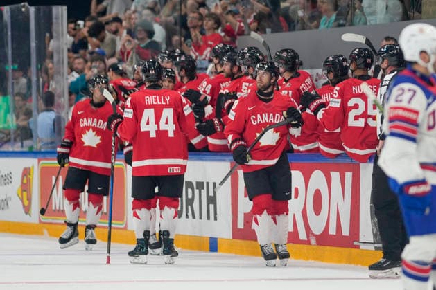 FRIBOURG, SWITZERLAND - MAY 28: Parker Wotherspoon of Canada R), Morgan Rielly of Canada C) celebrates second goal for Canada during the 2026 IIHF Ice hockey, Eishockey World Championship, WM, Weltmeisterschaft Switzerland game between Canada and USA at BCF Arena on May 28, 2026 in Fribourg, Fribourg. Fribourg BCF Arena Fribourg Switzerland Copyright: xJustPictures.ch JarixPestelaccix jp-en-EuSpIm-JP6_JAR_Canada_USA_28May2026_00123