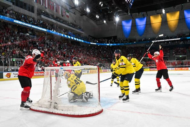 ZURICH, SWITZERLAND - MAY 28: Calvin Thurkauf of Switzerland L) celebrates after scoring a goal against goalkeeper Magnus Hellberg of Sweden during the 2026 IIHF Ice hockey, Eishockey World Championship, WM, Weltmeisterschaft Switzerland game between Switzerland and Sweden at Swiss Life Arena on May 28, 2026 in Zurich, Zurich. Zurich Swiss Life Arena Zurich Switzerland Copyright: xJustPictures.ch AndreaxBrancax jp-en-EuSpIm-JP7_ANB_FinCze_28052026_5991