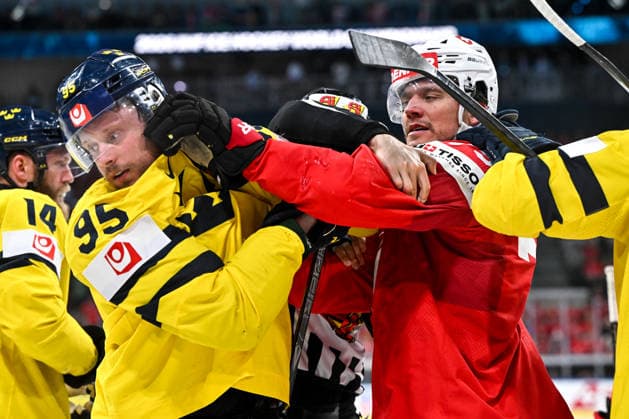ZURICH, SWITZERLAND - MAY 28: Calvin Thurkauf of Switzerland R) against Jacob de la Rose of Sweden L) during the 2026 IIHF Ice hockey, Eishockey World Championship, WM, Weltmeisterschaft Switzerland game between Switzerland and Sweden at Swiss Life Arena on May 28, 2026 in Zurich, Zurich. Zurich Swiss Life Arena Zurich Switzerland Copyright: xJustPictures.ch AndreaxBrancax jp-en-EuSpIm-JP7_ANB_FinCze_28052026_2565