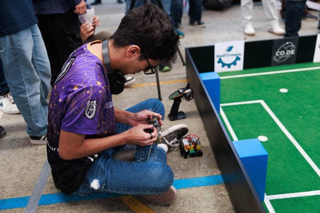 Futbots MX robotic football tournament in Mexico City MEXICO CITY, MEXICO - MAY 28: A participant prepares his robot ahead of matches during the Futbots MX robotic tournament, at the School of Mechanical and Electrical Engineering (ESIME), in Mexico City, Mexico on May 28, 2026. ESIME hosted a regional qualifying round for the national Futbot MX Robotics Cup, a tabletop robotics competition where participants control robots in simulated football matches as part of World Cup year activities. Daniel Cardenas Anadolu Mexico City Mexico. Editorial use only. Please get in touch for any other usage.  Copyright: x2026xAnadoluxDanielxCardenasx