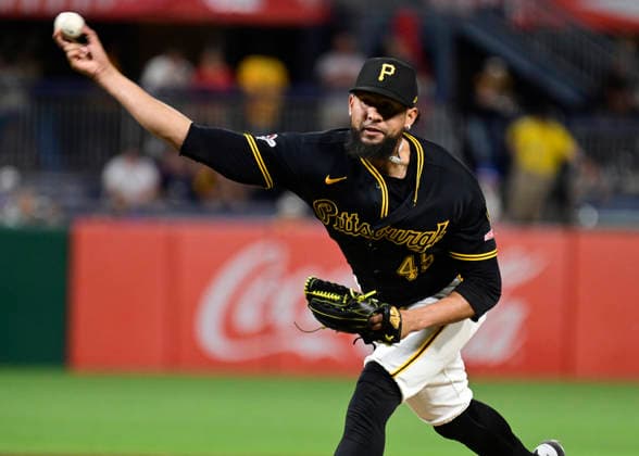 Pittsburgh Pirates pitcher Yohan Ramírez (49) throws in the ninth inning of the Chicago Cubs 7-2 win at PNC Park on Thursday, May 28, 2026 in Pittsburgh.  PIT2026052825 ArchiexCarpenter