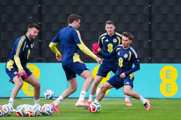 Grant Hanley of Scotland (far left) & Billy Gilmour of Scotland (right). Scotland Team Training, Football, Hampden Park, Glasgow, Scotland, UK - 29 May 2026Glasgow Hampden Park United Kingdom EDITORIAL USE ONLY No use with unauthorised audio, video, data, fixture lists, club league logos or live services. Online in-match use limited to 120 images, no video emulation. No use in betting, games or single club league player publications.  Copyright: xStuartxWallace Shutterstockx 16902976ad